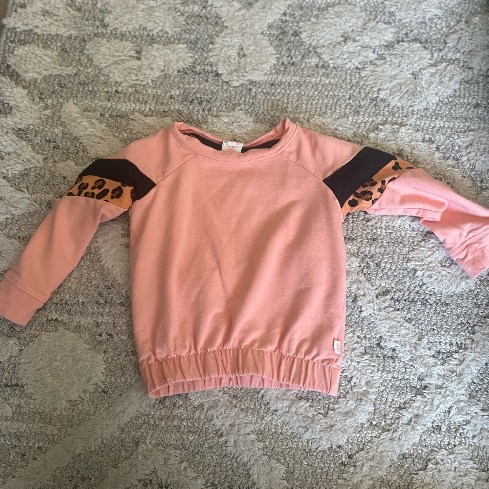 Pink sweater with cheetah detail